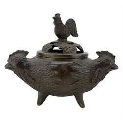 Later 19th Century  Chinese bronze censer, the trifom base cast with three Cockerel masks, with pierced cover and Cockerel knop, raised upon tripod supports, H13cm
