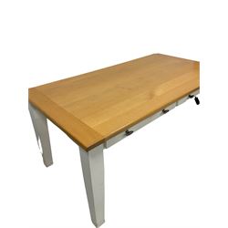 Rectangular beech dining table, the rectangular top over two frieze drawers, raised on square tapering supports 