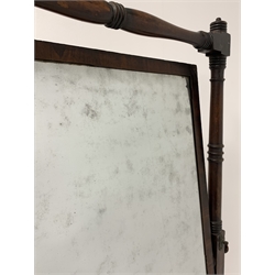  Mahogany Cheval mirror circa 1820, with ring turned supports and stretchers raised on splayed base with brass cup castors, 83cm x 175cm  