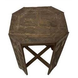 Carved hardwood occasional table, octagonal top carved with stylised Gecko and bird motifs, with geometric fish in in the border, supports carved with trees, united by X-stretcher