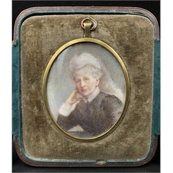 Early 20th century cased miniature portrait, half-length watercolour on ivory of an elderly woman wearing a white lace cap, grey hair and wearing a black dress 7cm x 5.5cm, in the original leather easel back case. This item has been registered for sale under Section 10 of the APHA Ivory Act
