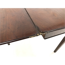 Georgian mahogany fold over tea table, raised on square moulded supports