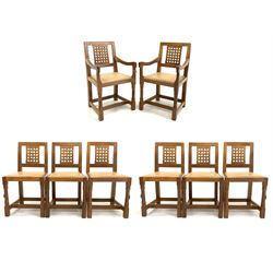 Peter 'Rabbitman' Heap of Wetwang - Yorkshire oak set of eight (6+2) dining chairs, carved lattice backs and studded leather upholstered seats, raised on octagonal supports, carved with rabbit signature (W53cm)