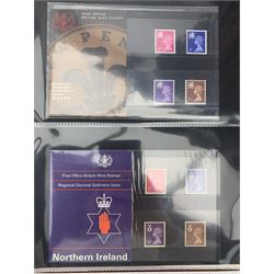 Queen Elizabeth II mint stamps in presentation packs and on album pages, many being low face value or non barcoded definitive, miniature sheets etc, housed in eight ring binder folders and an album 