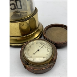 Early 20th century brass and glass ticket or Plato clock, together with a pocket barometer in small leather case, 