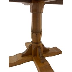 Wrenman - adzed oak dining table, octagonal top on carved pedestal base, cruciform sledge feet with scroll carved terminals, carved with proud wren signature, by Robert (Bob) Hunter of Thirlby