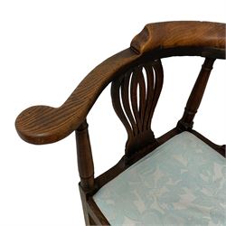 18th century elm corner elbow chair, the shaped back and arms with scrolled terminals on turned supports and pierced vasiform splats, square seat with drop-in cushion on square supports joined by plain stretchers