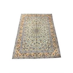 Persian design ivory rug, with overall floral design 