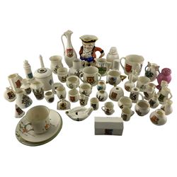 Quantity of Goss crested china including model of Queen Philippa's record chest found in Knaresborough castle, Toby jug, Eddystone lighthouse, hair tidy, hand painted trio, covered urn etc. approx 55pieces