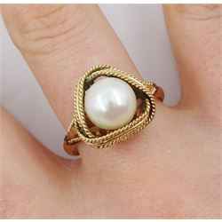 14ct gold single stone pearl knot design ring, stamped
