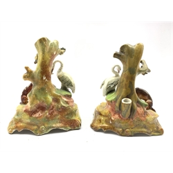 Pair of Victorian Staffordshire spill vases, each modelled as scenes from Aesop's fable The Fox and the Stork, H15cm