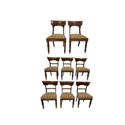 Set of six William IV mahogany dining chairs, the shaped cresting rail over seat upholstered in chequered fabric, raised on turned and reeded supports, together with a pair of Victorian chairs in similar design with drop in seat pad 