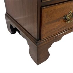 Georgian mahogany chest, the rectangular top over four graduating oak-lined drawers, each inlaid with boxwood, ebony and satinwood bandings, raised on bracket feet 