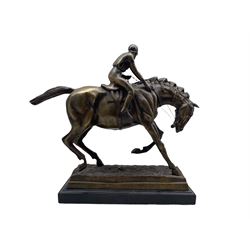 Bronze model of a racehorse with jockey up on marble base H34cm x L38cm