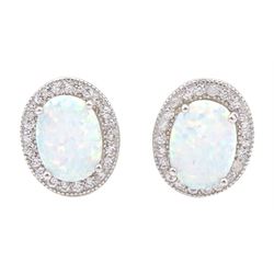 Pair of silver opal and cubic zirconia cluster stud earrings, stamped 925