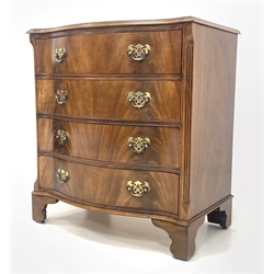 Georgian style mahogany serpentine front chest, moulded top over four cock beaded drawers, canted and fluted corners, raised on bracket supports 