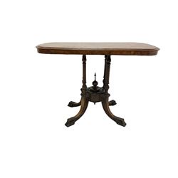 Victorian walnut centre table, the quarter veneered top over four turned and fluted columns, leading into four splayed and inlaid supports W99cm, H68cm, D49cm