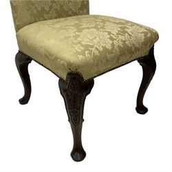 18th century and later walnut side chair, rectangular back over overstuffed seat upholstered in pale celadon damask fabric with stud work, scroll carved cabriole supports decorated with leaf carved panels and intertwined strapwork on pad feet 
Provenance: From the Estate of the late Dowager Lady St Oswald