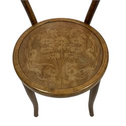 Thonet - bentwood chair, the seat panel decorated with flowers and ribbon tie, on tapering splayed supports, paper label to the underneath inscribed 'Thonet' 
