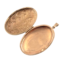 9ct rose gold hinged locket, engraved and embossed decoration hallmarked, approx 6.6gm