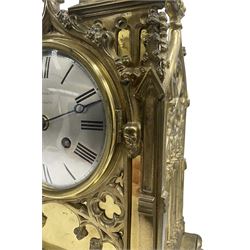 John  Knight Saunders of Warminster - mid nineteenth century 8-day fusee bracket clock in a brass gothic inspired case decorated with crenelations, crockets, pinnacles, tracery and other features typically used to embellish gothic churches and buildings, with a silvered convex dial engraved with the makers name, Roman numerals and steel moon hands within a cast brass bezel and conforming convex glass, single train timepiece fusee movement. With pendulum and key.
Clock cases such as this reflect the mid Victorian gothic revival period championed by the Victorian architects Augustus Pugin, George Gilbert Scott and Charles Barry. Greatly inspired by the building of the New Houses of Parliament and other public buildings erected at the time in the revived gothic style. 
John Knight Saunders is recorded as working in Warminster (Wiltshire) 1833-1844.
A most interesting record of this clockmakers short life is given in 