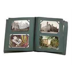Early 20th century Post Card album containing various postcards including scenes of Sheffield, Whitby, York, family portraits, Scarborough and Skegness comical postcards etc 