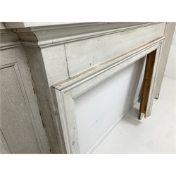 Early 20th century painted pine fire surround, with panelled returns (aperture 122cm x 110cm) (returns W47cm)
