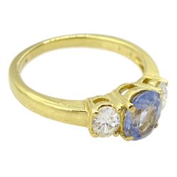 18ct gold three stone oval cut sapphire and oval cut diamond ring, stamped 750, sapphire approx 0.95 carat, total diamond weight approx 0.40 carat