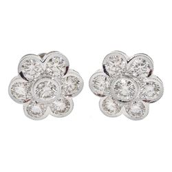 Pair of 18ct white gold round brilliant cut, daisy cluster stud earrings, total diamond weight 2.96 carat