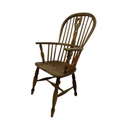 19th century elm Windsor chair, high stick back with pierced beech splat, raised on turned supports united by H-stretcher