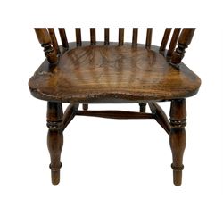 19th century child's elm Windsor chair, double hoop stick back over dished seat, raised on ring turned supports united by swell turned H-stretcher