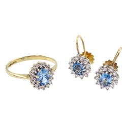 9ct gold oval cut blue topaz and round brilliant cut diamond cluster ring and a pair of similar 9ct gold screw back earrings