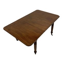 Mid 19th century mahogany extending dining table, the rectangular top, raised on turned supports, terminating in brass castors W125cm, H74cm, D108cm