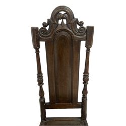 Pair 18th century oak hall chairs, high panelled backs with scroll carved and pierced pediment, fielded panel seats, turned front supports joined by plain stretchers and central matching scroll carved middle rail