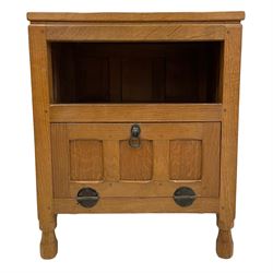 'Oakleafman' adzed oak bedside or lamp table, rectangular top over shelf and triple panelled fall front, panelled sides carved with leaf signature, by David Langstaff of Easingwold