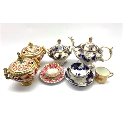 A pair of early 19th century pedestal sauce tureens, painted with gilt and iron red stylized leafage, acanthus leaf moulded covers and base, H17cm, A Rockingham style part tea set comprising a teapot, twin-handled sucrier, teacup and two saucers, early 19th century Coalport coffee can pattern no. 696 together with a mid-19th century porcelain teacup and saucer decorated with cabbage roses 