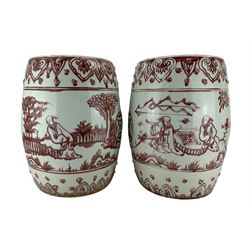 Pair of Chinese porcelain stools, each of barrel form, painted in copper-red with figures in a landscape, H45cm (2) Provenance: From the Estate of the late Dowager Lady St Oswald