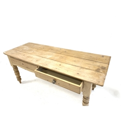 Victorian pine kitchen side table, fitted with two drawers over shaped apron, raised on turned supports 