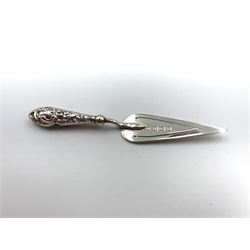 Edwardian silver trowel shape bookmark Birmingham 1904 by Crisford & Norris, another by the same maker 1909, a small trowel Birmingham 1908 by W H Leather and two sword shape bookmarks by Adie & Lovekin, one with amber glass pommel (5) 