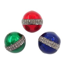 Three silver diamond set blue, green and red enamel beads, total diamond weight approx 0.75 carat