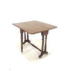 Victorian mahogany drop leaf Sutherland tea table, the rectangular double drop leaf moulded top raised on turned columns leading to a splayed support and two castors at each end W84cm, H69cm 