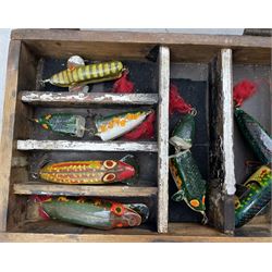 Two metal bound pine boxes containing six carved and painted fishing lures and other metal lures, together with a similar metal bound pine chest, L42cm 