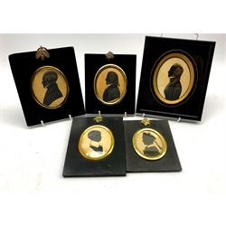 Five 19th century oval silhouette portraits, four in period ebonised frames, one in later glazed frame, largest 14cm x 16cm (5)