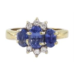9ct gold three stone oval sapphire and round brilliant cut diamond cluster ring