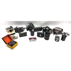 Assorted photographic items including Lumix FZ18 digital camera, Polaroid land camera with instruction booklet and film, Olympus IS digital camera etc