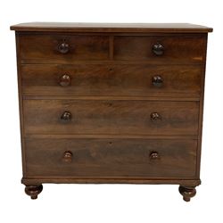 Victorian mahogany chest of drawers, fitted with two short and three long drawers raised on turned bun feet 