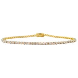 Yellow gold round brilliant cut diamond line bracelet, stamped 18K, total diamond weight approx 2.70 carat