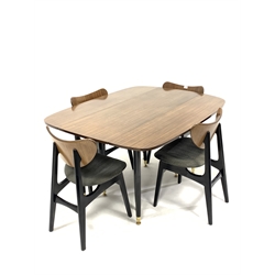 G-Plan - 'Librenza' drop leaf dining table, with gateleg action and ebonised supports, (106cm x 134cm, H72cm) together with a Set of four 'Librenza' butterfly dining chairs, with upholstered seats and raised on ebonised supports, W47cm