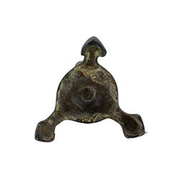 18th century Continental bronze tripod candlestick, with faceted candleholder, tapering square stem, dished circular base with three outswept supports H18cm, together with a 17th century latten slip top, indistinct makers mark to the gif-shaped bowl, L15cm (20