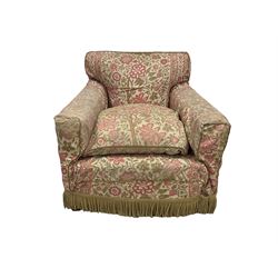 Early 20th century Howard design armchair, upholstered in neutral geometric fabric with sprung back and seat, hardwood frame, raised on square tapering supports, with matching seat cushion, the removable chair covering decorated with pink and green floral decoration
Provenance: property of a gentleman